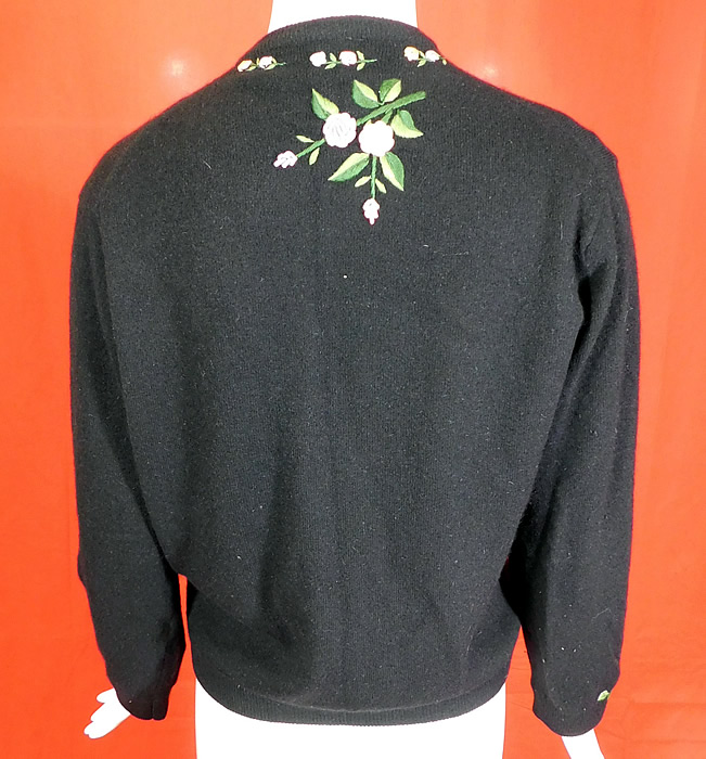 Vintage Hong Kong Black Lambswool Angora Rabbit Rosette Embroidered Sweater
This vintage Hong Kong black lambswool angora rabbit rosette embroidered sweater dates from the 1950s.