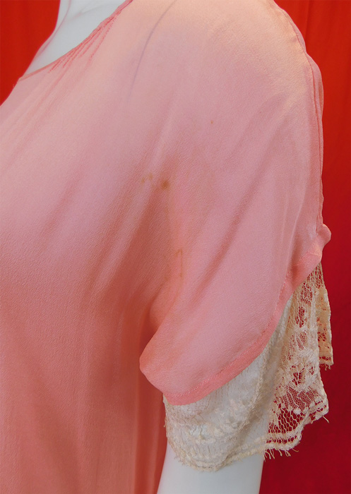 Vintage Pastel Pink Silk White Net Lace Overlay Skirt Belted Drop Waist Dress
It is in good condition, with only a few faint small age spot stains on ribbon trim ends and on the front sleeve (see close-up). This is truly a wonderful piece of wearable art! 