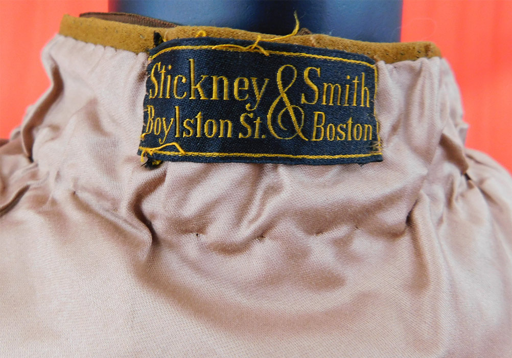 Victorian Brown Beige Wool Pinwheel Applique Silk Bow Trim Winter Cloak Cape
a "Stickney & Smith Boylston St. Boston" label sewn inside the neck. 