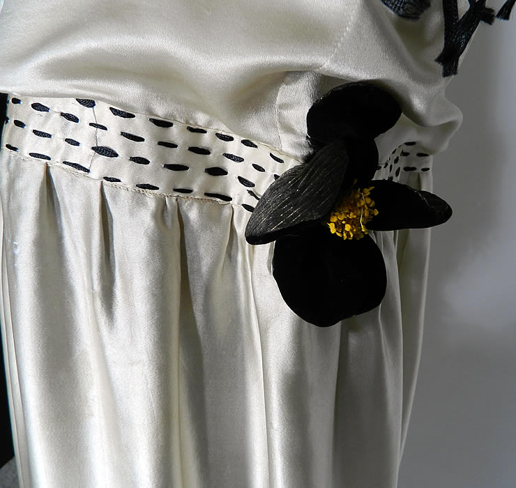 Vintage Art Deco White Silk Black Embroidered Fringe Drop Waist Flapper Dress close up.
