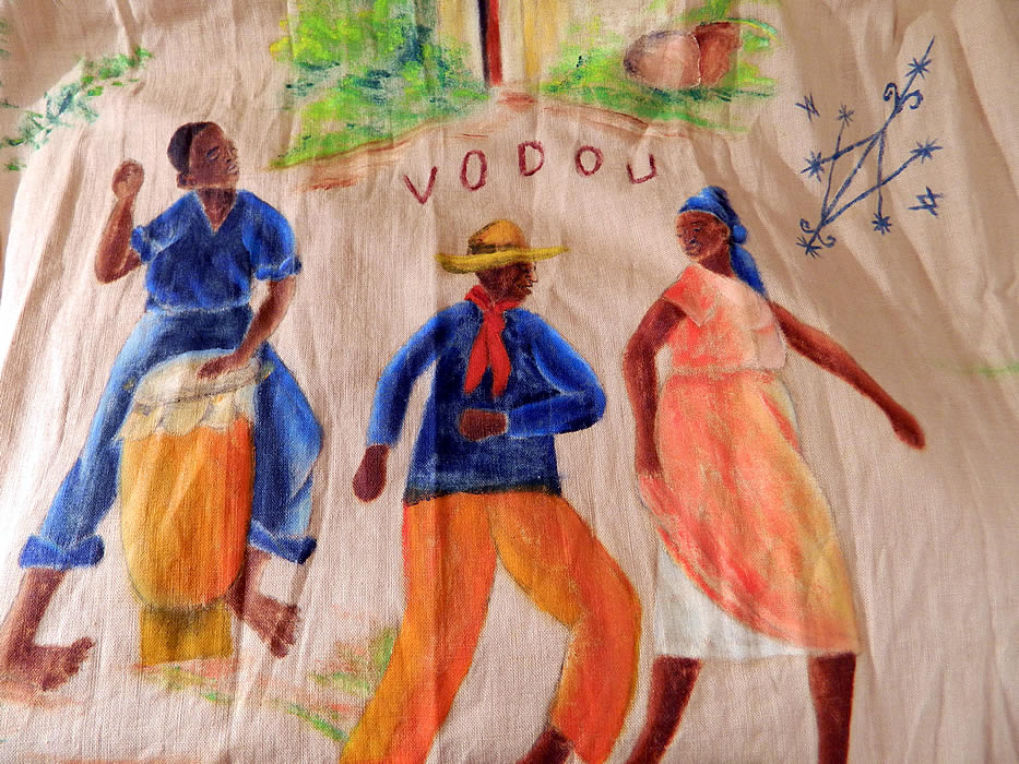 Vintage Fernand Pierre  Artist Signed Hand Painted  Haitian Vodou Circle Skirt. It is made of a linen fabric, with colorful hand painted picturesque artistic scenes of Haiti, including cock fighting and vodou.
