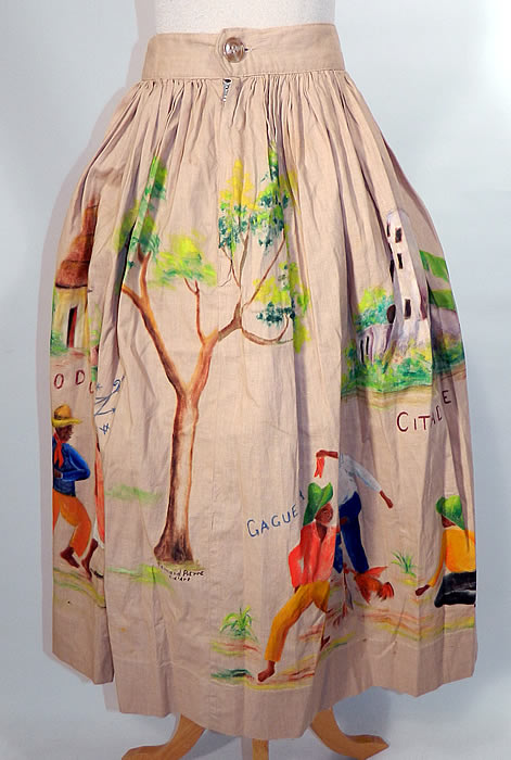 Vintage Fernand Pierre  Artist Signed Hand Painted  Haitian Vodou Circle Skirt.  The skirt measures 32 inches long, with a 24 inch waist. 