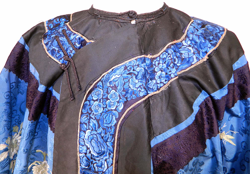 Antique Chinese Blue Silk Embroidered Insect Gourd Peach Floral Longevity Robe. It is hand stitched, made of a  blue silk damask brocade floral decorative patterned fabric, with  yellow, green, chartreuse color raised padded satin stitch hand embroidery work.