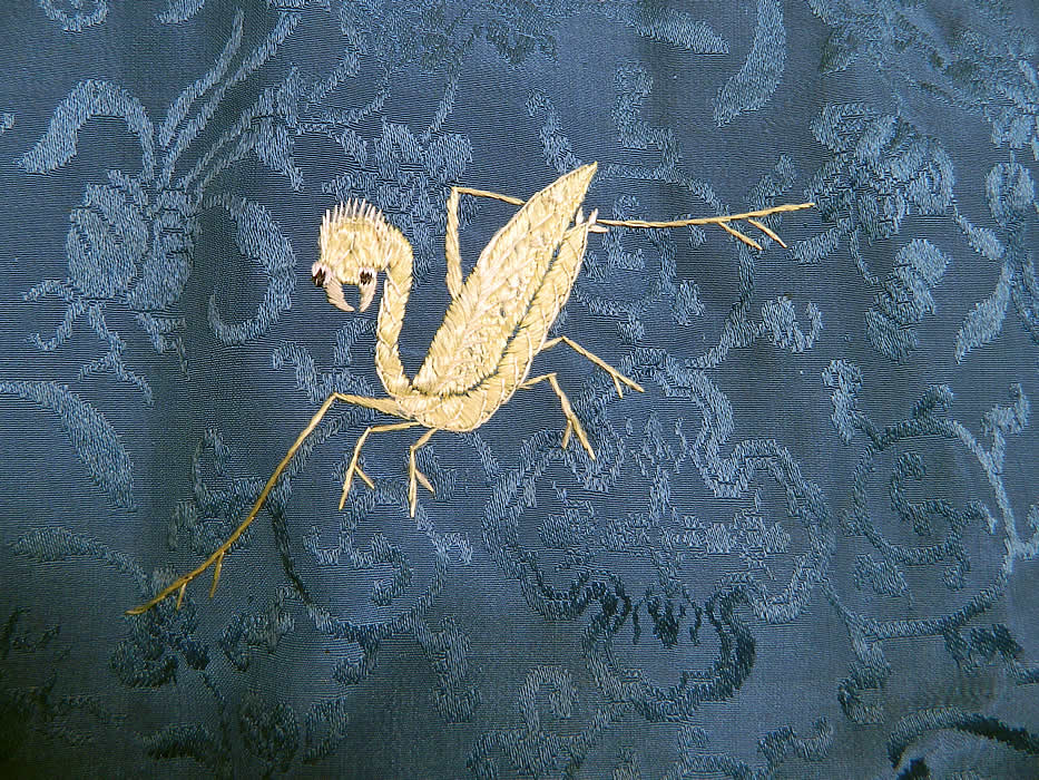 Antique Chinese Blue Silk Embroidered Insect Gourd Peach Floral Longevity Robe. The robe measures 35 inches long, 50 inches across the shoulders and has a 34 inch sleeve cuff circumference.