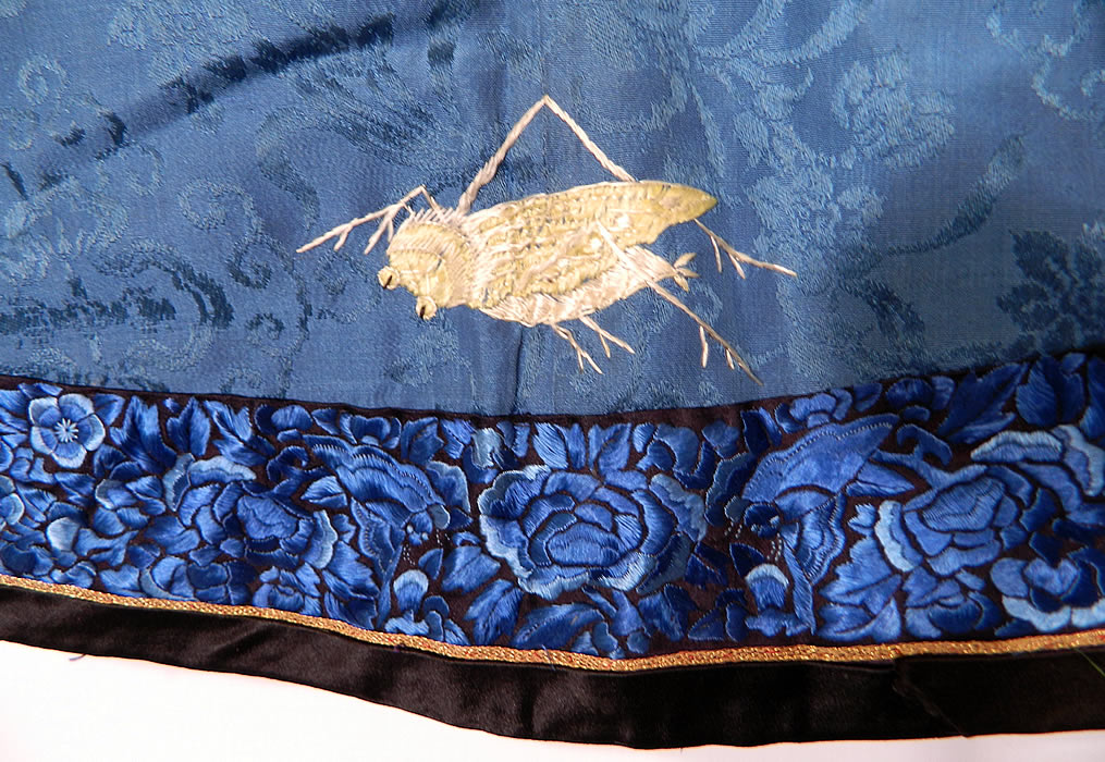 Antique Chinese Blue Silk Embroidered Insect Gourd Peach Floral Longevity Robe. It is in good  condition, with only some fraying on the back collar and some soiling staining along the sleeve band cuff trim. 