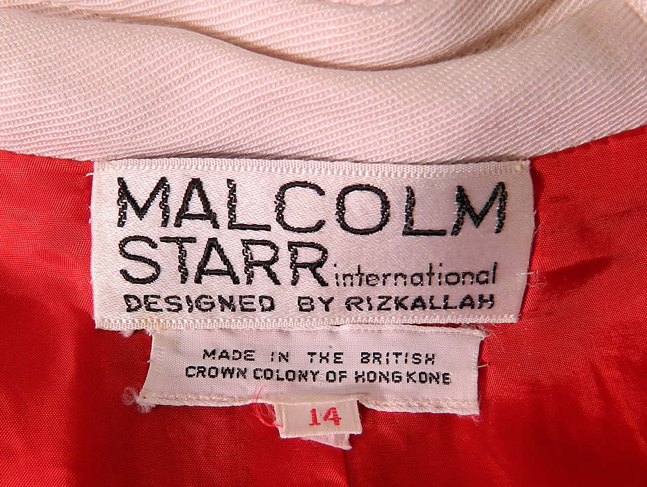 Vintage Malcolm Starr International Designed By Rizkallah Applique Coat Dress. This gorgeous couture overcoat style dress has a full front zipper closure, horseshoe shaped scoop neckline, long full sleeves and is fully lined. There is a "Malcolm Starr International Designed By Rizkallah" designer label and "Made in the British Crown Colony of Hong Kong" Size 14 tags sewn inside.