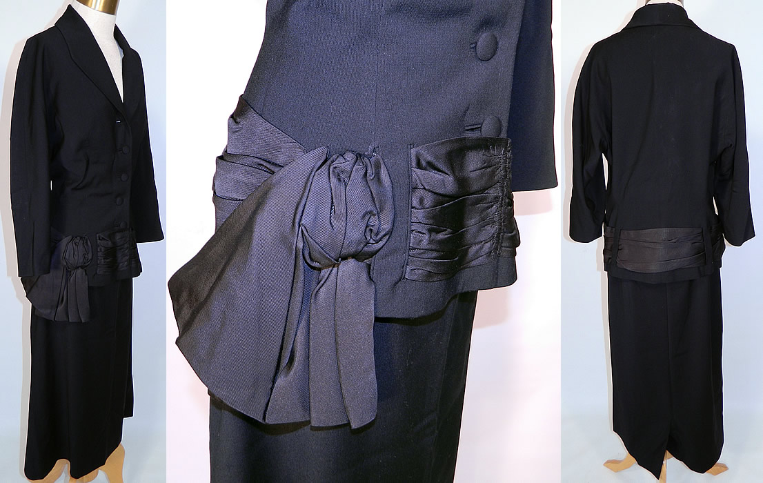 Vintage Black Wool Gabardine Ribbon Trim Sash Suit Jacket & Skirt. The jacket measures 24 inches long, with  a 40 inch waist, 42 inch bust and 15 inch back. There is a matching fabric long skirt, with side zipper closure and is unlined. The skirt measures 33 inches long, with 42 inch hips and a 32 inch waist. The outfit is in good condition, but has not been cleaned and has two tiny pin holes on the back of the jacket and is missing the top button. This is truly a wonderful piece of quality made wearable art! 