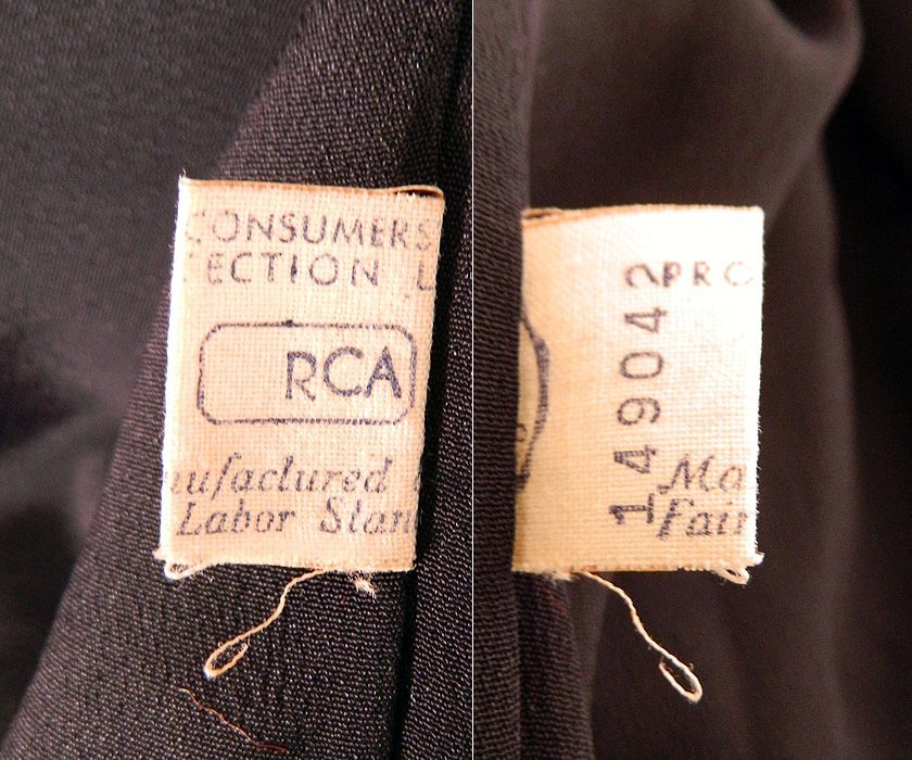 Vintage Black Wool Gabardine Ribbon Trim Sash Suit Jacket & Skirt. This classy beautiful black two piece suit has a tailored jacket, with wide lapel collar, long sleeves, fabric covered button front closure, silk ribbon cummerbund sash trim woven around the hips & tied on the side in a bow, fully lined, with a "RCA Manufactured Fair Labor Standard" tag sewn inside. 