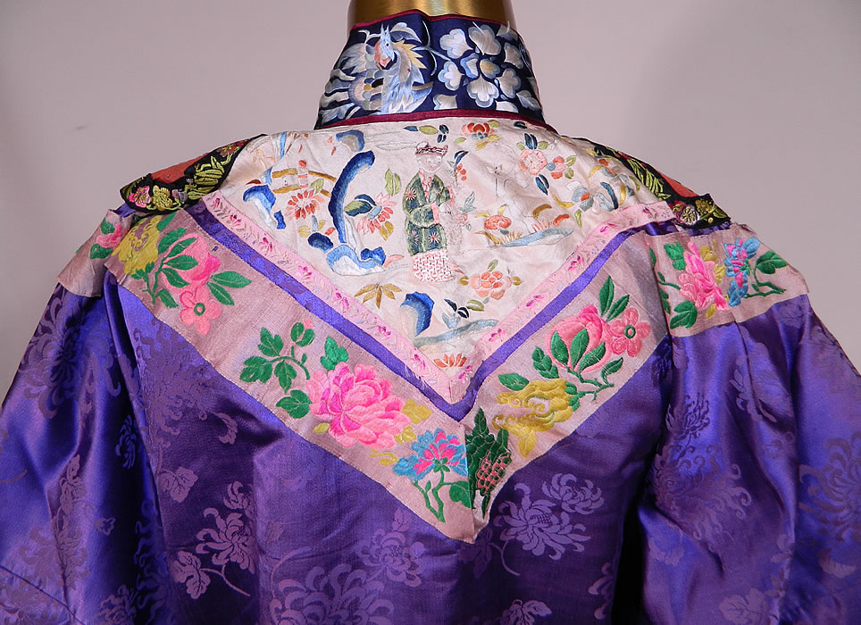 Antique Chinese Purple Silk Damask Floral Brocade Figural Embroidered Trim Robe
This is truly a wonderful piece of wearable antique Chinese art!