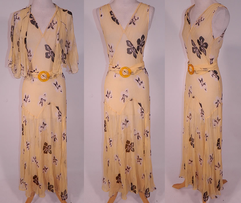 Vintage Yellow Silk Chiffon Black Floral Print Belted Bias Cut Dress & Jacket
This vintage yellow silk chiffon black floral print belted bias cut dress and jacket dates from the 1930s. It is made of a pastel yellow silk chiffon fabric, with a black and white floral poppy print pattern design. 