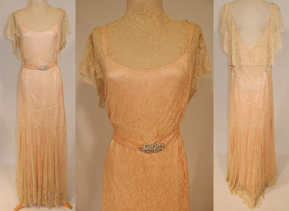 Vintage Cream Chantilly Lace Belted Bias Cut Dress Wedding Gown & Pink Silk Slip
This vintage cream chantilly lace belted bias cut dress wedding gown and pink silk slip dates from the 1930s. It is made of an off white cream color delicate fine sheer silk chantilly lace net fabric, with a floral vine leaf pattern design.