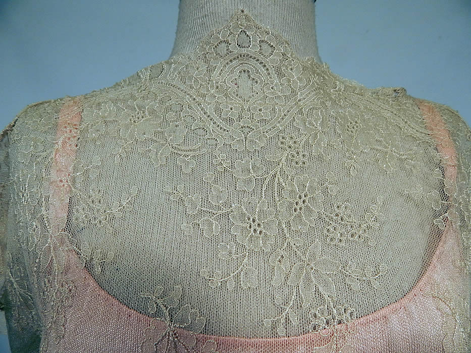 Vintage Cream Chantilly Lace Belted Bias Cut Dress Wedding Gown & Pink Silk Slip
The dress measures 60 inches long, with 36 inch hips, a 30 inch waist and 38 inch bust. Included is a pink pastel silk full slip underneath.