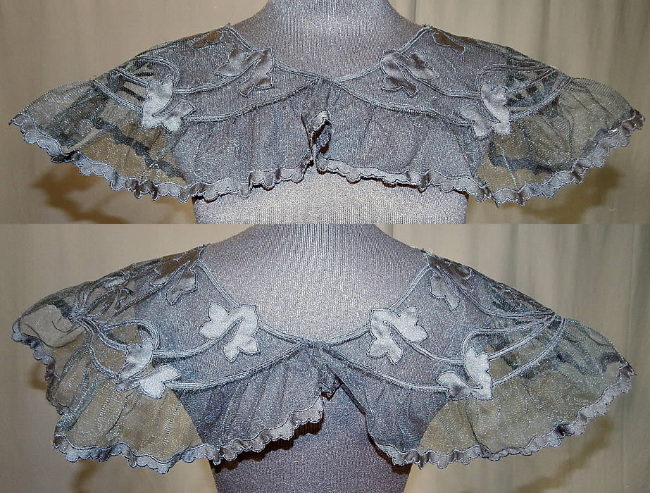 Vintage Black Silk Tulle Net Applique Shawl Collar Cape Capelet Dress Trim
This vintage black silk tulle net appliqué shawl collar cape capelet dress trim dates from the 1930s. It is made of a black sheer tulle mesh net fabric with black silk appliqué leaf shape cut outs and scalloped trim edging. 