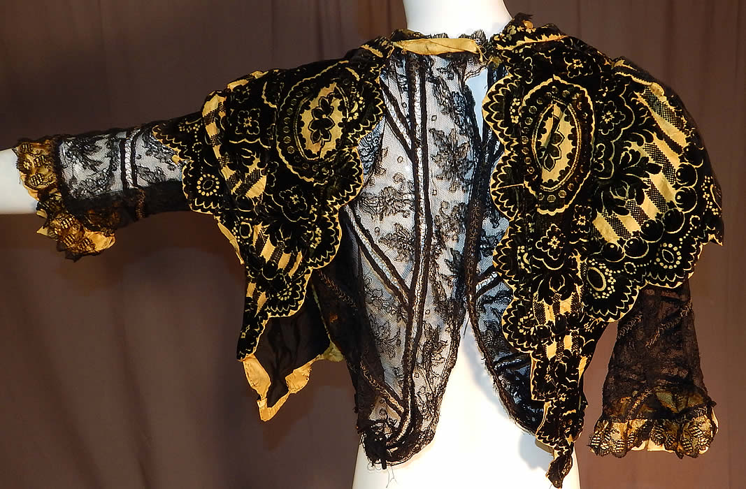Victorian Yellow Silk Black Burnout Voided Velvet Devore Chantilly Lace Bodice
The top measures 16 inches long, with a 24 inch waist and 34 inch bust. 