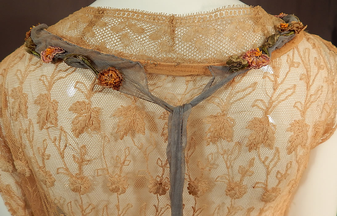Vintage Cream Tambour Embroidery Lace Silk Rosette Drop Waist Dress
The dress measures 49 inches long, with a 32 inch bust and 32 inch waist. It is in fair as-is condition, has not been cleaned, slightly dingy, with some faint discoloration on the net lace top and several small frayed holes weak areas in the ecru cream silk chiffon fabric inside lining the skirt. This is truly a rare, feminine, delicate piece of wearable lace, rosette art which would be great for design inspiration!