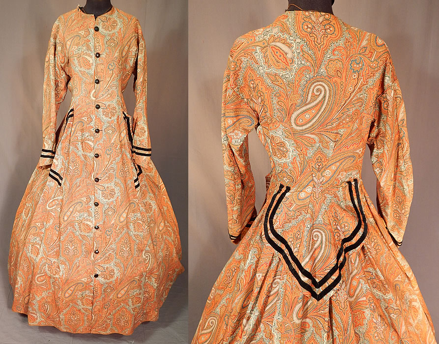 Victorian Civil War Era Paisley Wool Hoop Skirt Morning Wrapper Gown Dress
This antique Victorian Civil War era paisley wool hoop skirt morning wrapper gown dress dates from the 1860s. It is made of autumn fall shades of brown, orange, red, blue and cream color fine woven wool paisley print pattern fabric