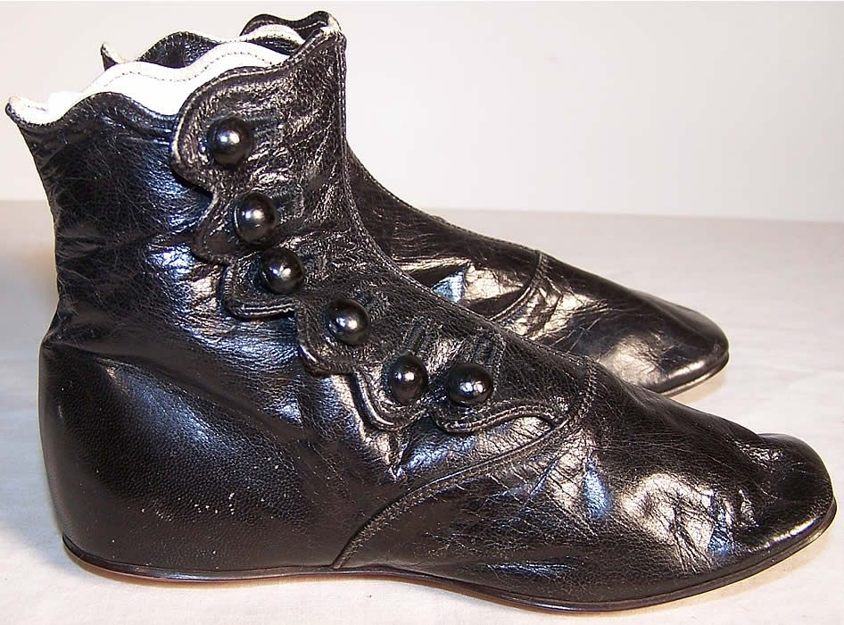 Unworn Victorian Black High Button Baby Boots  Front view.