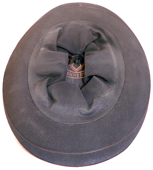 Vintage Kennedys Victorian Gentlemen Black Silk Collapsible Opera Top Hat. This dashing dapper gentlemen's opera "topper" top hat is collapsible, which is stored flat and pops up to be worn.