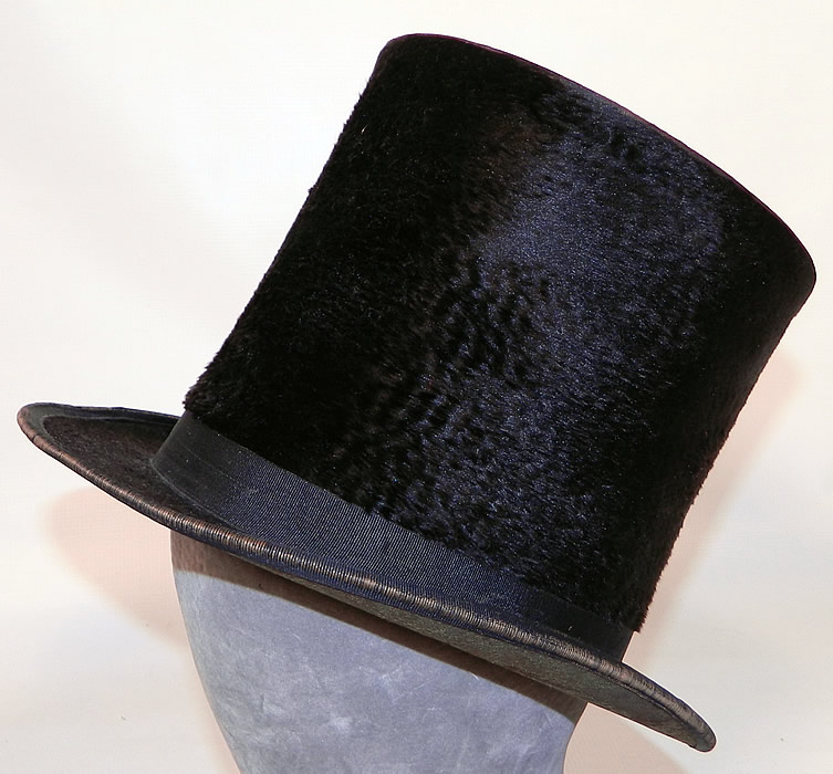 Victorian Corey & Stewart NJ Civil War Tall Lincoln Black Beaver Stovepipe Top Hat .It is made of a plush black felted beaver fur, with a black silk ribbon hat band trim.  