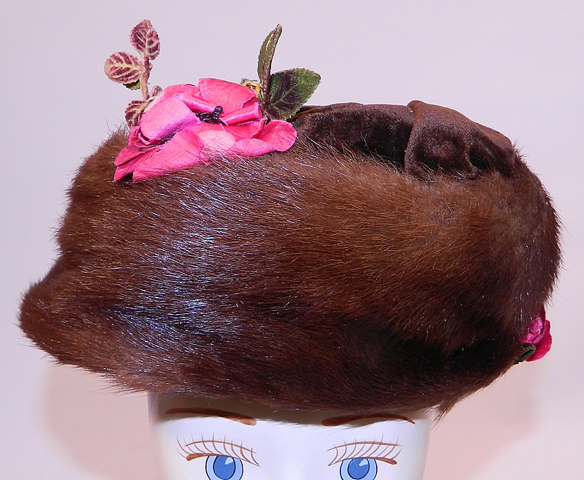 Titanic Edwardian Brown Velvet Mink Fur Floral Trim Toque Traveling Winter Hat
This antique Edwardian Titanic era brown velvet mink fur floral trim toque traveling winter hat dates from 1912. It is made of a dark chocolate brown color velvet fabric, with brown mink fur and pink silk flower trim. 