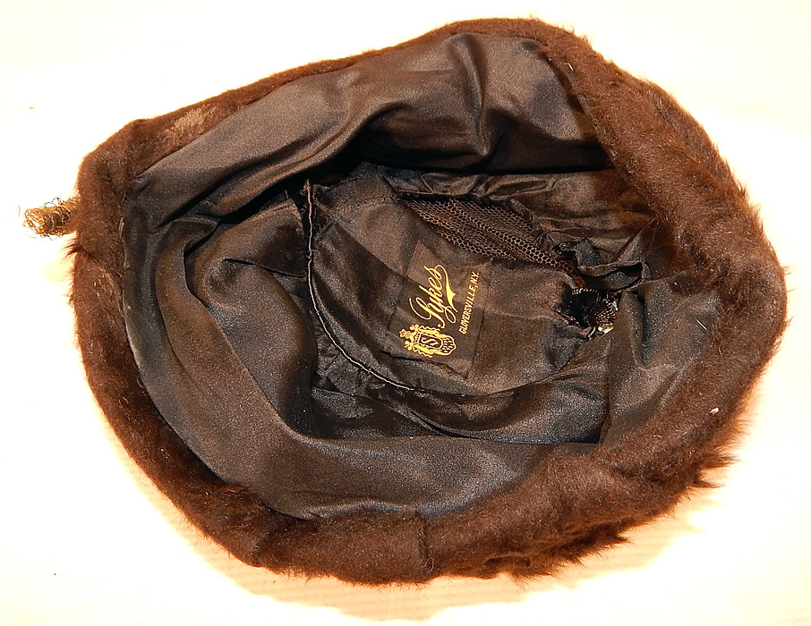 Vintage Sykes NY Label Brown Beaver Felt Fur Gold Jeweled Trim Toque Cloche Hat
It is fully lined in a black silk fabric with a "Sykes Gloversville, N.Y." label inside.