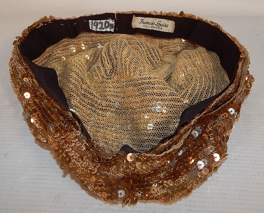 Vintage Frances Louise Hollywood Label Art Deco Gold Sequin Flapper Cloche Hat
The hat measures 23 inches inside circumference. It is in good condition, with only a few missing sequin which are barely noticeable. This is truly a wonderful piece of wearable Art Deco millinery art! 