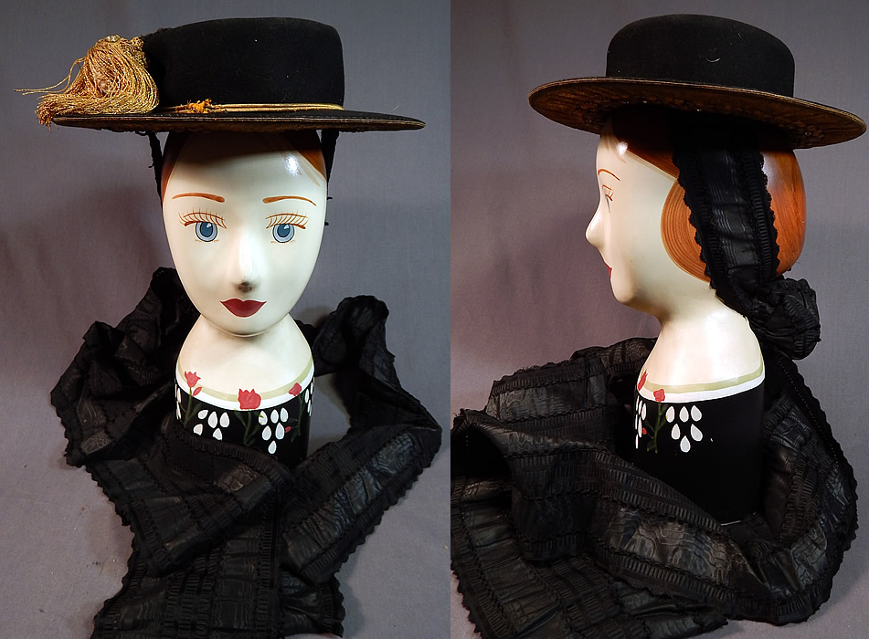 Antique Gold Bullion Embroidered Tracht Bavarian German Austrian Folk Costume Hat
It is made of a black wool felt fabric, with gold bullion raised embroidery work accented with gold metal prong set rhinestones and gold lamé damask weave ribbon trim edging under the brim.