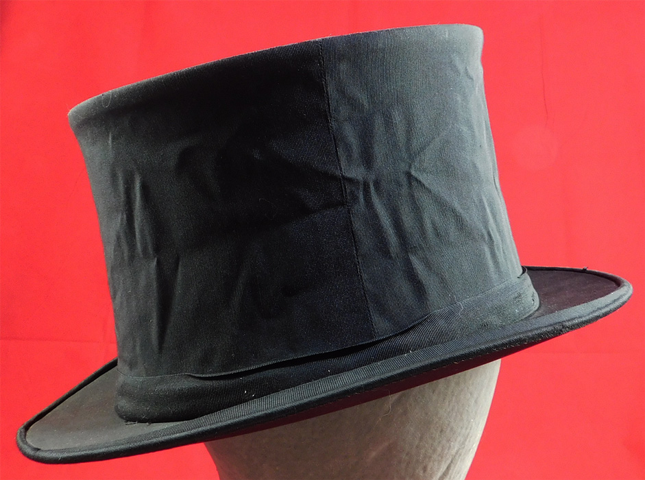 Vintage Finchley Establishment Fifth Ave NY Men's Black Silk Collapsible Opera Top Hat
This dashing dapper gentleman's opera "topper" top hat is collapsible, which is stored flat and pops up to be worn.