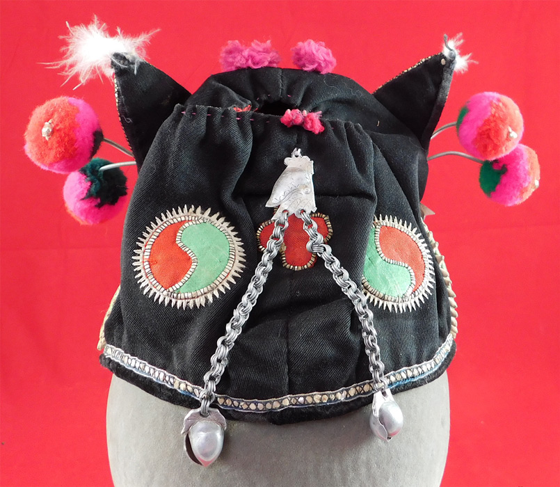 Antique Chinese Bai Miao Minority Childrens Festival Embroidered Tiger Wind Hat
This is truly a beautiful piece of one of a kind antique Chinese children's hat art!