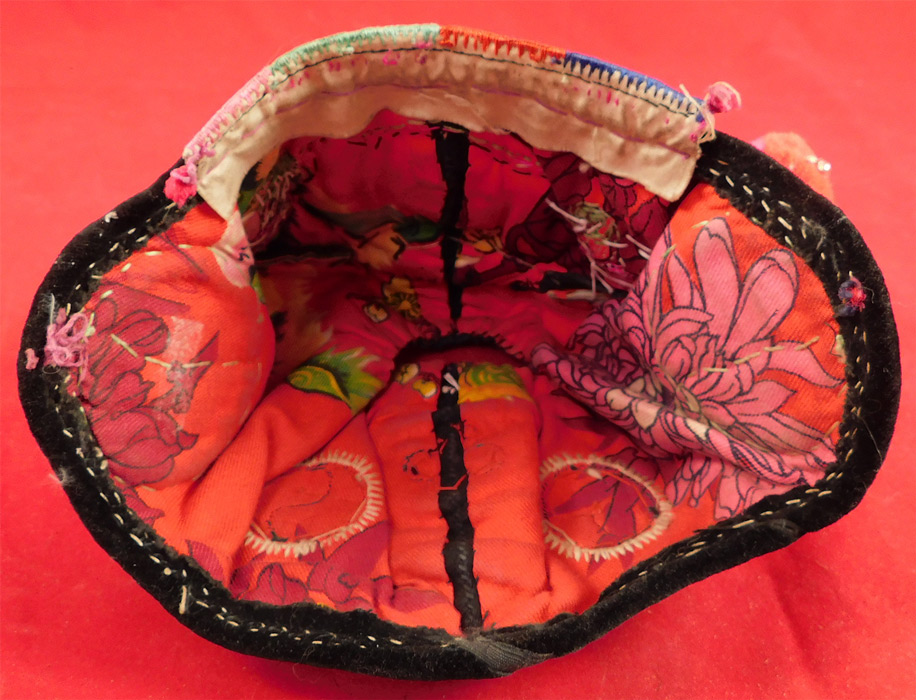 Antique Chinese Bai Miao Minority Childrens Festival Embroidered Tiger Wind Hat
The hat measures 19 inches inside crown circumference. 