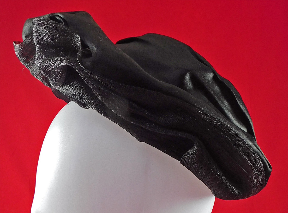 Victorian Black Crinoline Woven Horse Hair Silk Jet Beaded Trim Bonnet Hat
It is made of a black crinoline woven horse hair and black silk fabric with pleated gathering and a jet beaded black faceted glass button trim accent. 