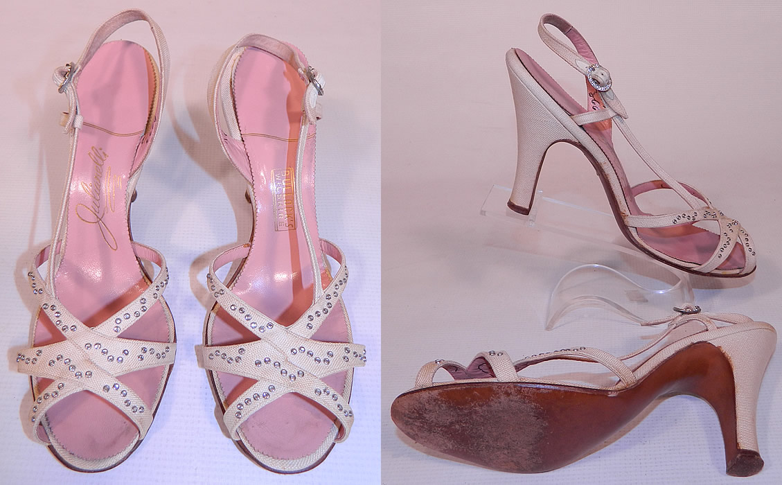 Vintage Julianelli White Linen Rhinestone Strap Sling Back Sandal Shoes. The shoes measure 9 1/2 inches long, 3 inches wide, with 3 1/2 inch high heels. They have been gently worn, with only minor wear. These are truly a wonderful piece of quality made wearable shoe art!
