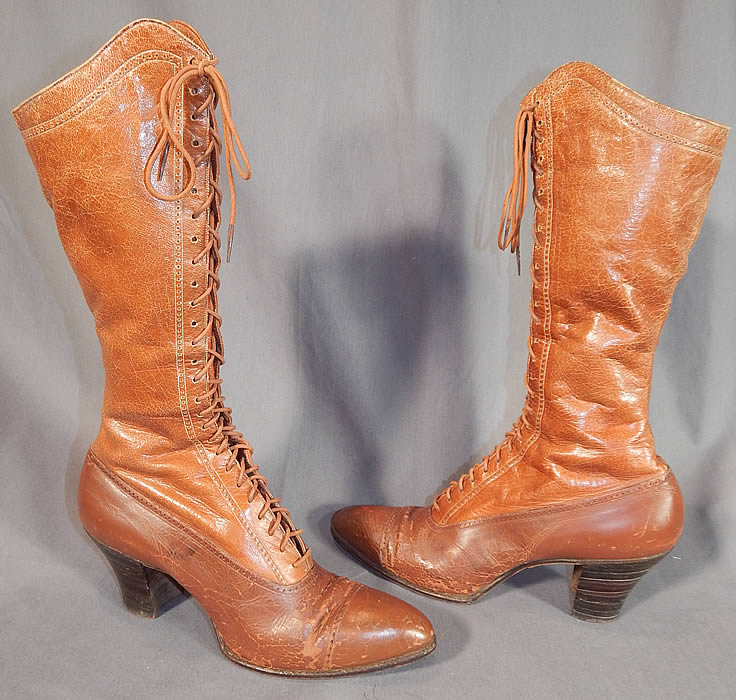 Victorian Vintage I. Miller NY Brown Leather High Top Lace-up Hiking Boots Shoes
This pair of antique Victorian era vintage I. Miller NY brown leather high top lace-up hiking boots shoes date from 1900. They are made of a two tone light brown tan leather, with decorative cutwork designs.