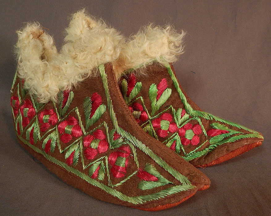Vintage Hungarian Colorful Folk Embroidery Leather Curly Lamb Fur Lined Slippers
This pair of vintage antique Hungarian colorful folk embroidery leather curly lamb fur lined slippers date from 1900.