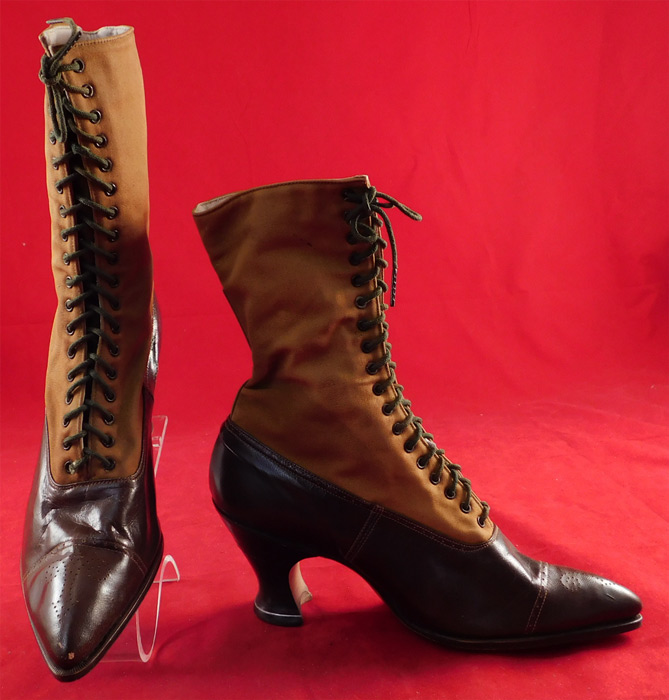 Unworn Victorian Two Tone Brown Cloth & Leather High Top Lace-up Boots
This pair of unworn antique Victorian era two tone brown cloth and leather high top lace-up boots date from 1900. 