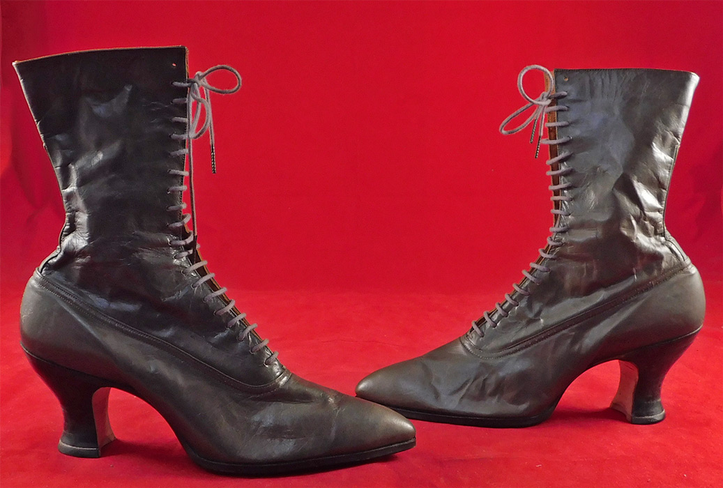 Victorian Unworn Gray Leather High Top Lace-up French Spool Heel Boots
They are made of a dove gray color leather. These beautiful boots have pointed toes, the original gray shoe string laces for closure and black stacked wooden French spool heels. 