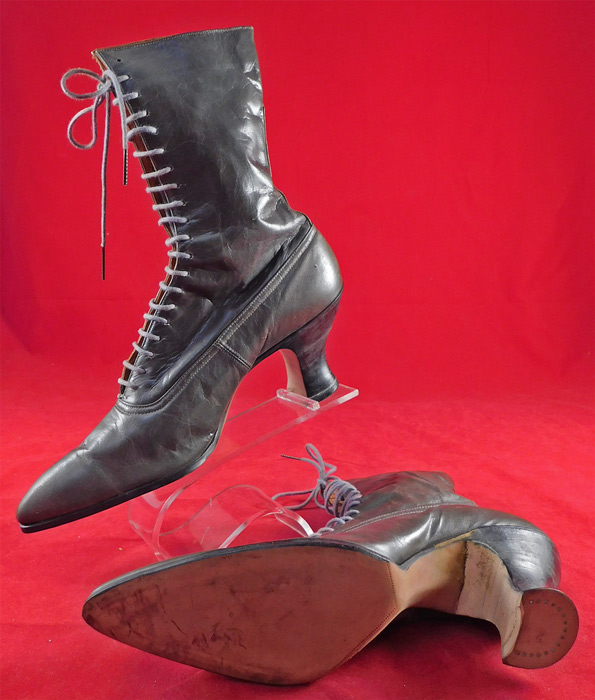 Victorian Unworn Gray Leather High Top Lace-up French Spool Heel Boots
The boots measure 10 inches tall, 10 inches long, 2 1/2 inches wide, with 2 1/2 inch high heels. These antique boots are difficult to size for today's foot and are approximately a US size 6 narrow width.