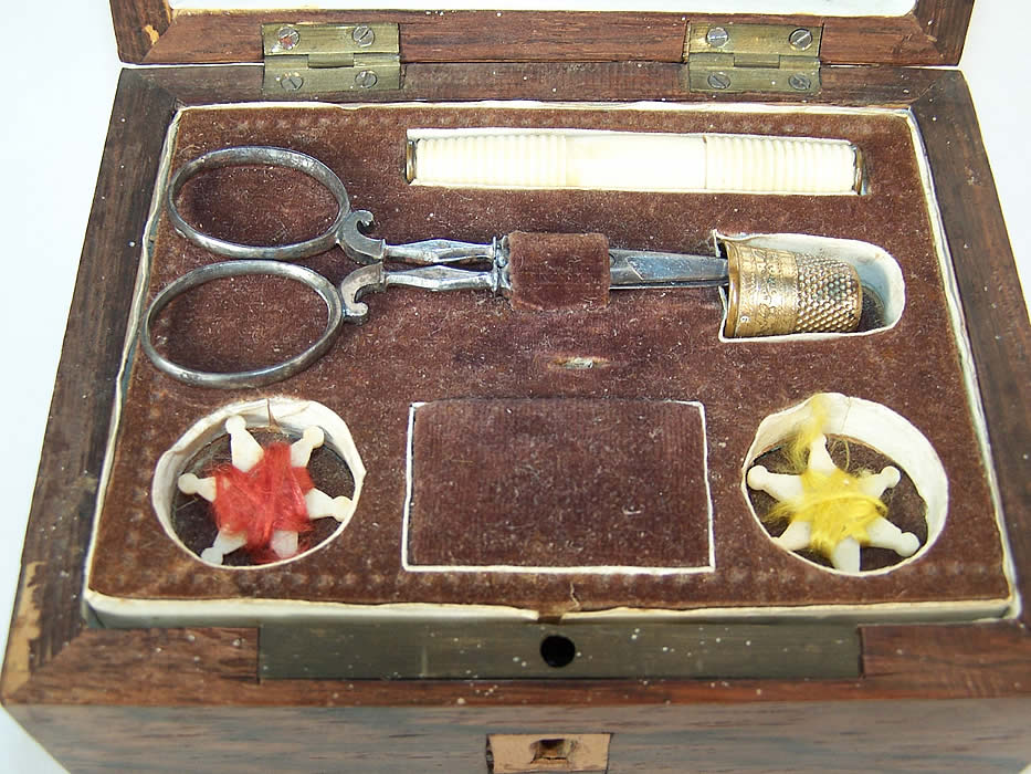Antique Wooden Inlay Victorian Sewing Box Needlework Tools Close up.