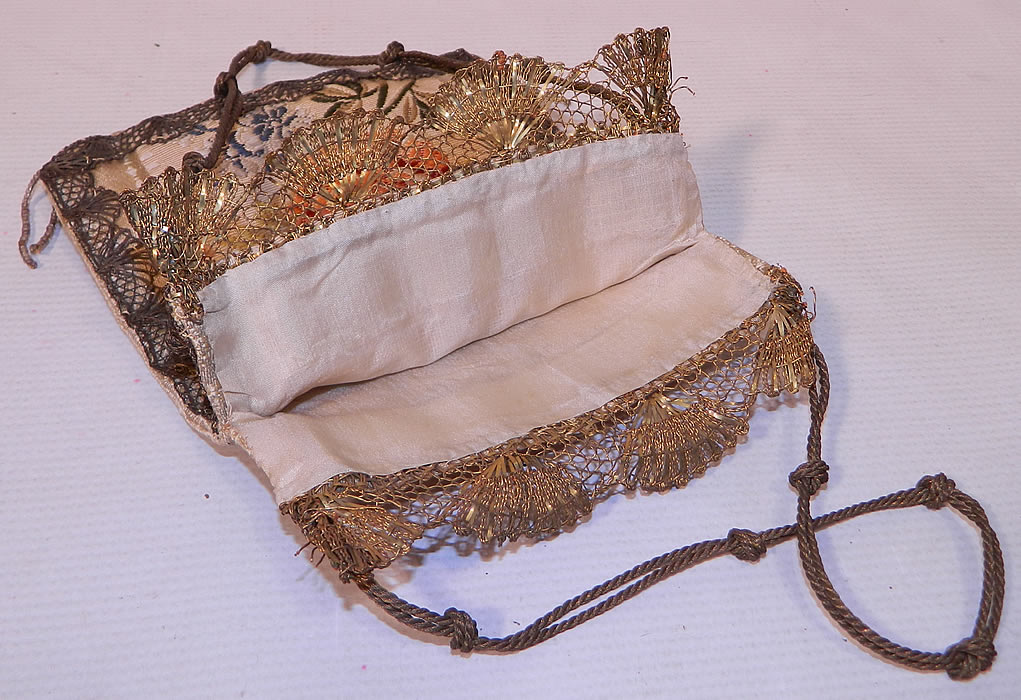 Antique 18th Century French Silk Damask Brocade Fabric Gold Lace Purse. This pretty purse has a square pouch bag style with an open top and no closure. The purse measures 7 1/2 inches long and 6 inches wide. It is in good condition. This is truly an amazing piece of an early antique textile art!