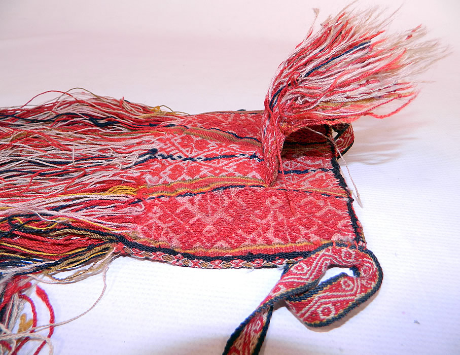 Antique Bolivia Chuspa Coca Red Wool Woven Weave Hand Loom Fringe Boho Bag
The purse style boho bag has a woven strap for carrying, a small outer coin pouch pocket on one side and long fringe trim ends. 