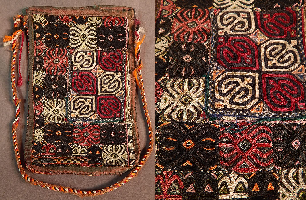 Vintage Afghan Uzbek Lakai Embroidery Tribal Ethnic Boho Bedouin Pouch Purse
This vintage Afghan Uzbek Lakai embroidery tribal ethnic boho bedouin pouch purse dates from the 1960s. It is hand stitched, made of a patchwork of pieced together colorful chain stitch Lakai embroidery work done in traditional geometric shield shapes.