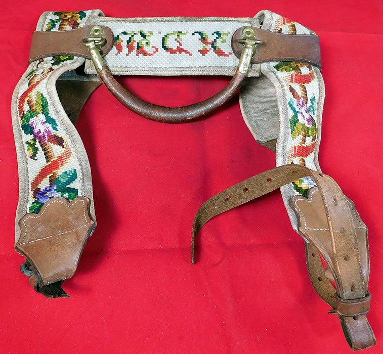 Victorian Antique Riley & Lyn Patent 1870 Needlepoint Leather Strap Bedroll
It is made of leather straps, with an off white kid leather backing colorful needlepoint hand embroidered decorative floral garland designs on the fronts and the monogrammed initials "KDW" on the top.
