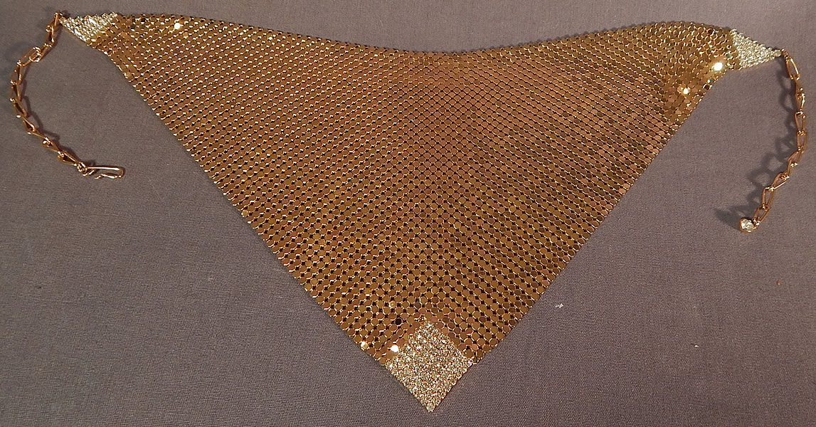 Vintage Whiting & Davis Gold Metal Mesh Rhinestone Bib Necklace Scarf Collar
The necklace measures 12 1/2 inches wide at the top, 22 inches wide at the top with chain link strap and 6 inches long in the front. It is in excellent condition. This is truly a wonderful piece of chain mail metal mesh wearable art!
