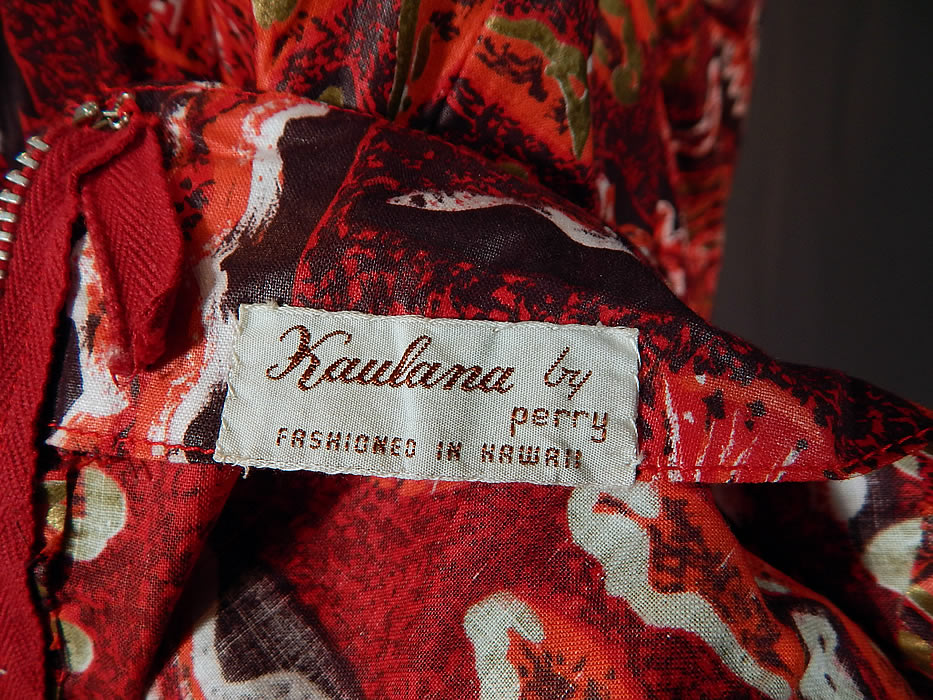Vintage Kaulana By Perry Hawaiian Polynesian Print Red Cotton MuuMuu Maxi Dress
There is a "Kaulana By Perry Fashioned in Hawaii" label sewn inside. 