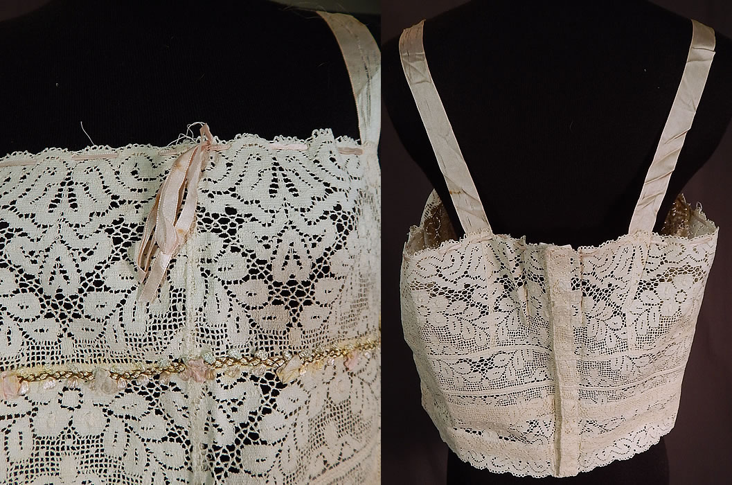 Vintage Bien Jolie Brassiere White Filet Lace Rosette Camisole Bra Bandeau Top
This beautiful brassiere bra bandeau top has a short cropped camisole style, with pink silk ribbon shoulder straps, a pink silk ribbon woven around the adjustable drawstring neckline, a hook strap hanging down the front for attaching to a skirt, hook closures down the back and is sheer unlined. 