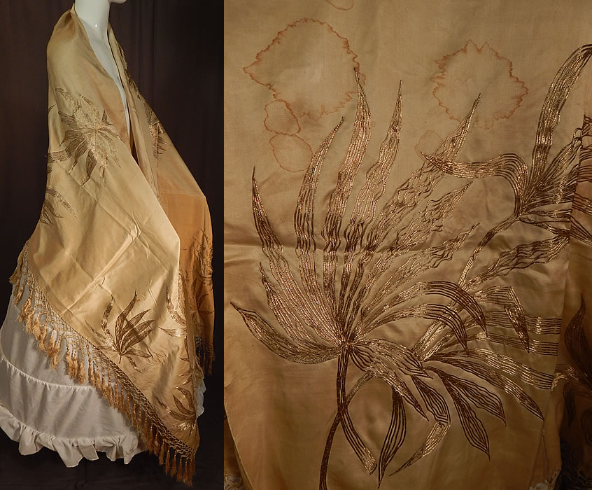 Vintage Art Nouveau Silk Silver Gold Lamé Embroidered Piano Shawl Scarf Stole Wrap
This lovely Art Nouveau inspired piano shawl has a long scarf, stole style wrap with hand knotted silk fringe trim around the bottom and the top is unadorned.