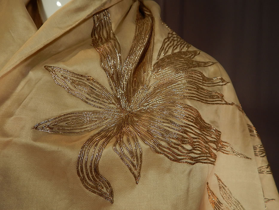 Vintage Art Nouveau Silk Silver Gold Lam&eacute; Embroidered Piano Shawl Scarf Stole Wrap
The shawl measures 108 inches long, 29 inches wide and has additional 7 inch long fringe trim. 