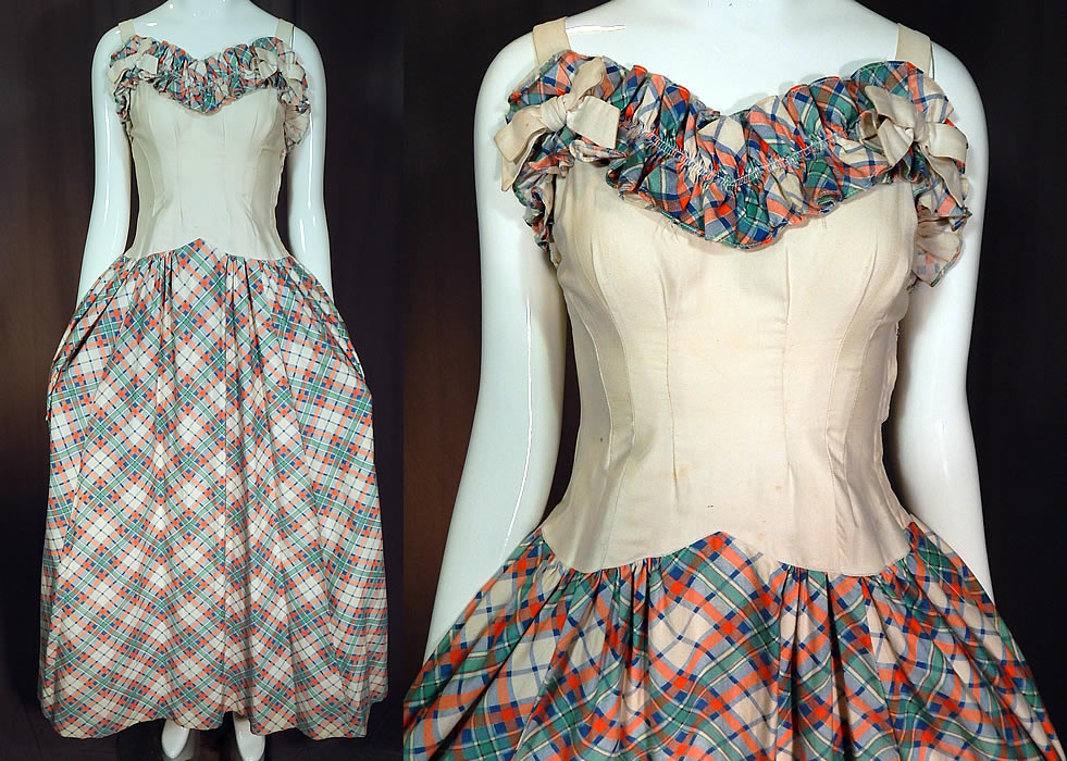 Vintage White Cotton Pastel Plaid Print Ruffle Flounce Bow Trim Maxi Dress
This vintage white cotton pastel plaid print ruffle flounce bow trim maxi dress dates from the 1940s. It is made of a white cotton fabric with a colorful blue, green, peach pastel plaid print pattern design.