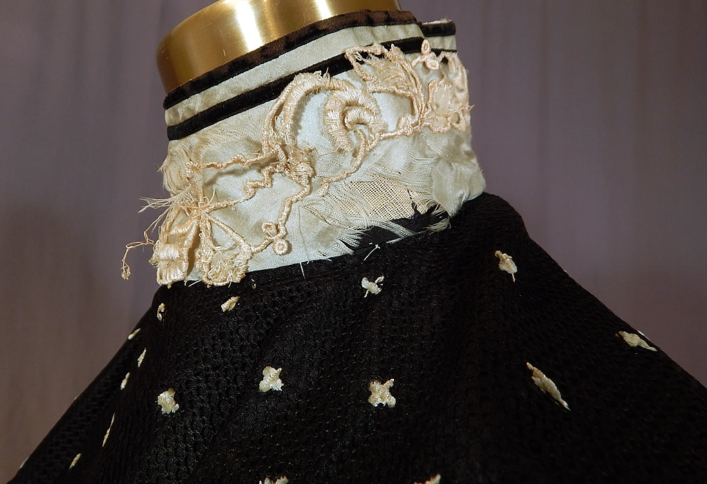 Victorian Black Mesh Net Silk Ribbon Stripe Gown Bodice Skirt Train Dress
It is in good condition, with only some fraying of the blue silk ribbon, white lace appliqu&eacute; trim on the collar, cuffs and a small hole in the net on the back top (see close-ups).