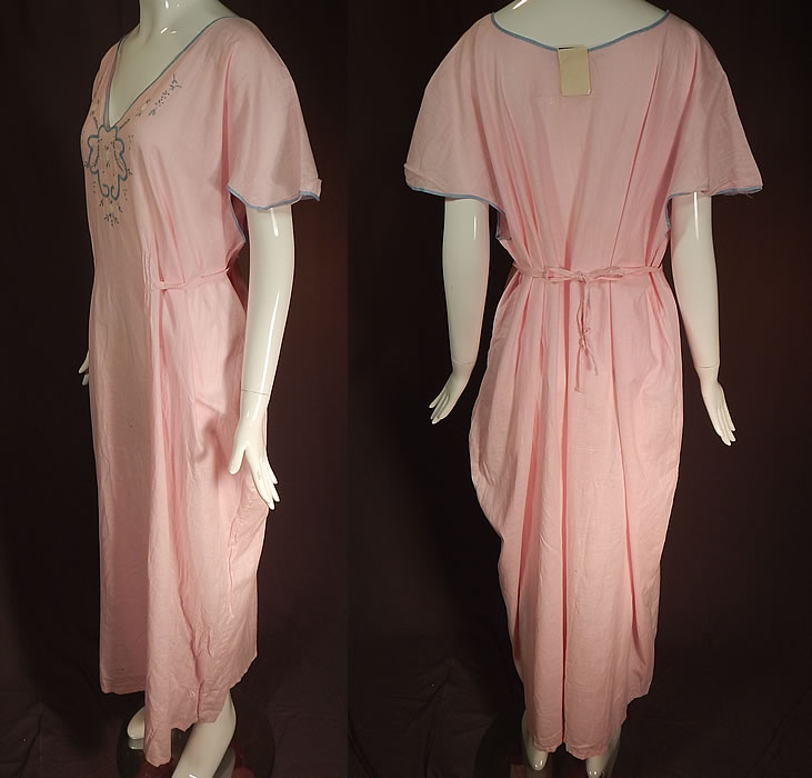 Vintage Peer Nities Hand Made Porto Rico Pink Linen Embroidered Nightgown NWT
This beautiful boudoir nightgown is loose fitting, a long floor length, with a V front blue trim neckline, short flared cap sleeves and an adjustable attached belted back tie sash. The nightgown is a large size measuring 53 inches long, with a 56 inch bust, 64 inch waist and 64 inch hips.